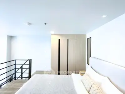Modern bedroom with minimalist design and natural light