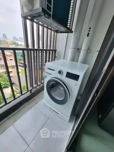 Modern balcony with washing machine and city view