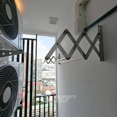 Modern balcony with city view and air conditioning units