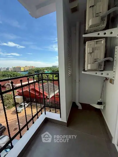 Charming balcony with scenic view, perfect for relaxation and enjoying the outdoors.