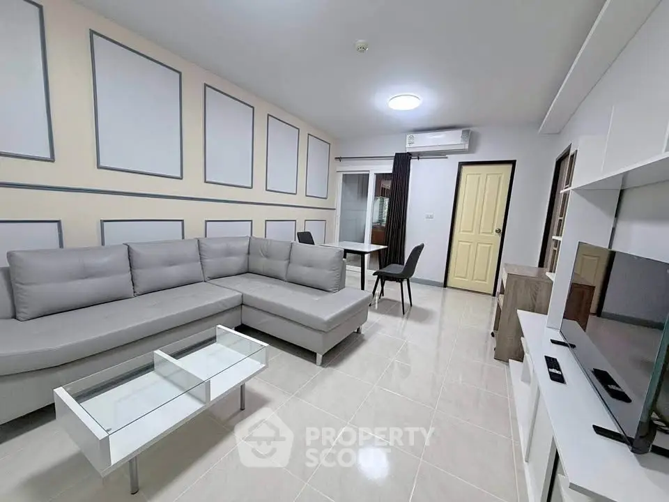 Modern living room with stylish sectional sofa and sleek decor