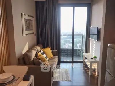 Cozy living room with modern decor and balcony view in high-rise apartment