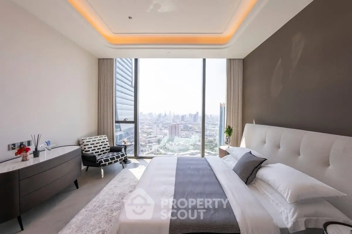 Luxurious bedroom with stunning city view and modern decor