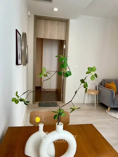 Modern living room with stylish decor and wooden accents