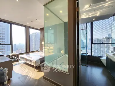 Luxurious modern bedroom with ensuite bathroom and stunning city view