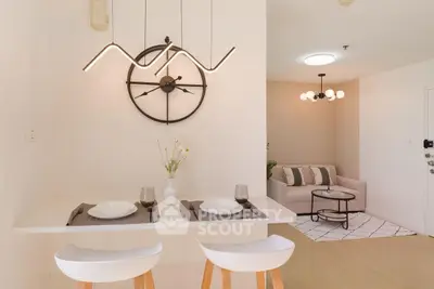 Modern minimalist living room with stylish lighting and cozy seating area