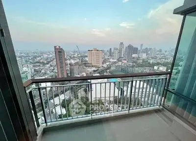 Stunning cityscape view from a modern high-rise balcony, perfect for urban living.