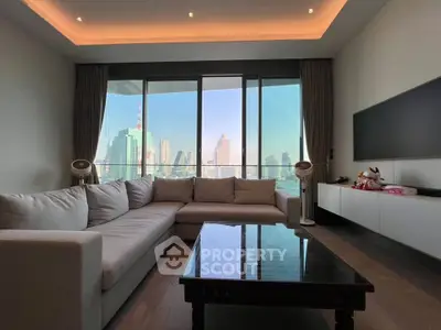 Spacious living room with stunning city view and modern decor