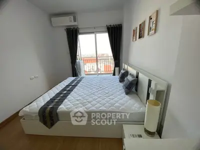 Modern bedroom with balcony view and stylish decor