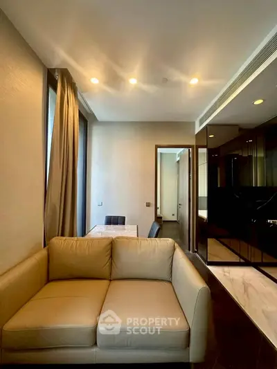 Modern living room with elegant beige sofa and stylish decor