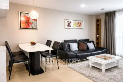 Modern living room with stylish furniture and elegant decor in a cozy apartment setting.