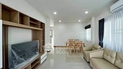 Spacious modern living room with elegant furniture and natural light