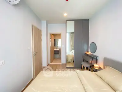 Modern bedroom with ensuite bathroom and stylish decor