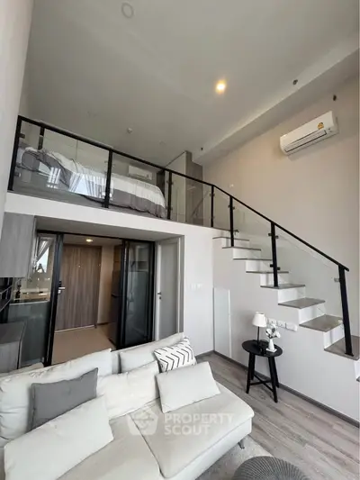 Modern loft apartment with mezzanine bedroom and stylish living area