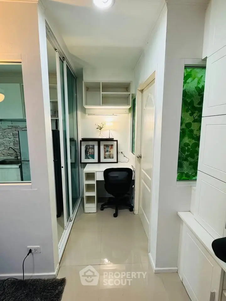 Compact study nook with desk and chair in modern apartment hallway