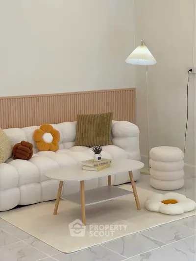 Stylish modern living room with cozy sofa and elegant decor