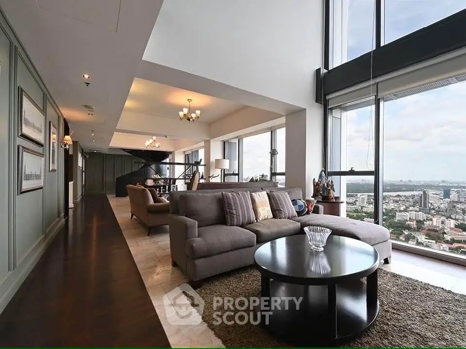 Luxurious penthouse living room with panoramic city views and elegant decor