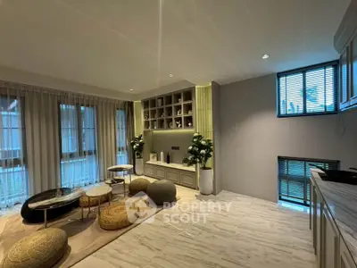 Spacious modern living room with elegant decor and natural light