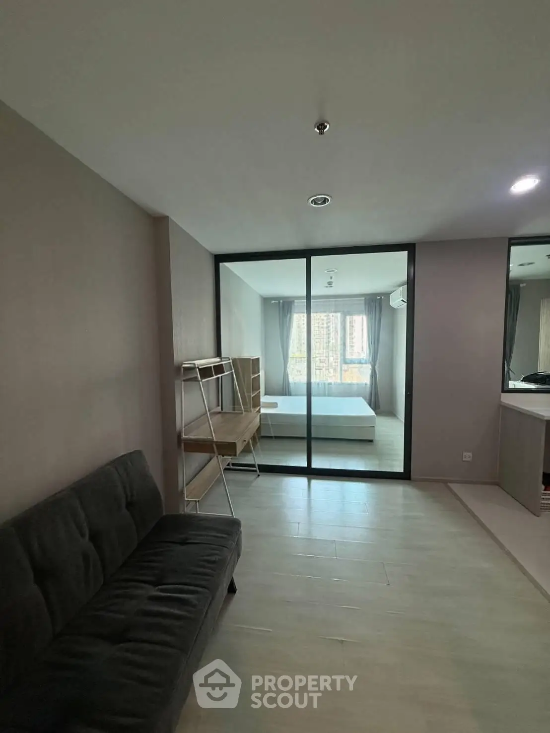 Modern apartment interior with glass partition and minimalist design
