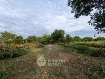 Expansive rural landscape with lush greenery and serene surroundings, perfect for nature lovers seeking tranquility.