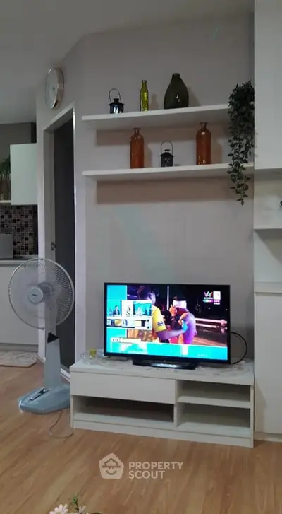 Cozy living room with modern decor and entertainment setup