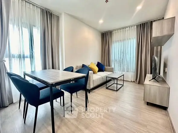 Modern living room with stylish furniture and natural light