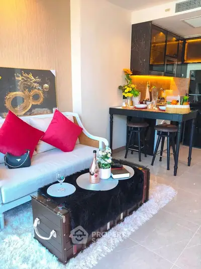 Stylish living room with modern decor and open kitchen layout