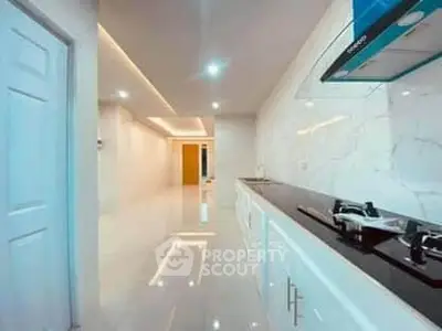 Modern kitchen with sleek design and gas stove in a bright apartment