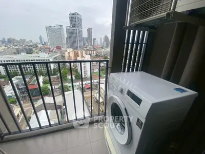 High-rise condo balcony with washing machine and stunning city view