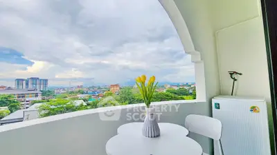 Charming balcony with stunning city view, perfect for relaxation and enjoying the skyline.