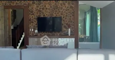 Modern living room with unique wood accent wall and flat-screen TV