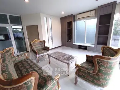 Elegant living room with classic furniture and air conditioning