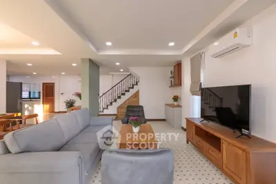 Spacious modern living room with elegant furniture and natural light