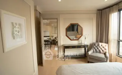 Elegant bedroom with stylish decor and natural light
