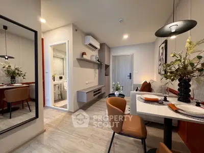 Modern living room with stylish dining area and contemporary decor