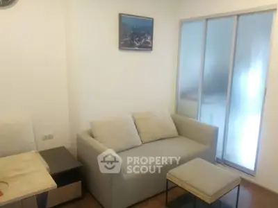 Cozy living room with modern sofa and sliding glass doors