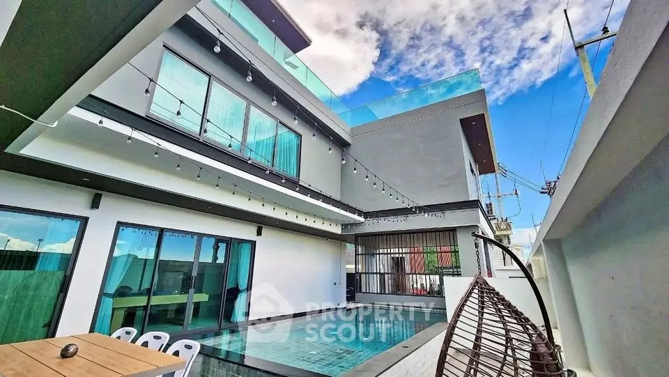 Modern luxury villa with private pool and spacious balcony, perfect for relaxation and entertainment.