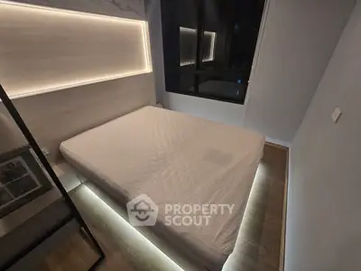 Modern bedroom with ambient lighting and sleek design