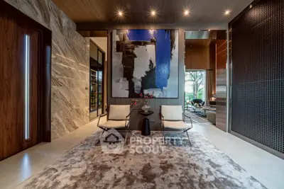 Luxurious modern living room with abstract art and elegant seating area