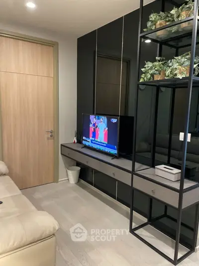 Modern living room with sleek TV unit and stylish decor