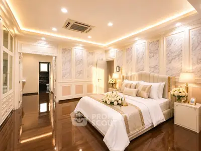 Luxurious bedroom with elegant decor and polished wooden floors in a high-end property.
