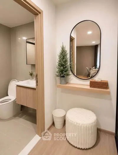 Modern bathroom with stylish decor and elegant fixtures in a contemporary apartment.