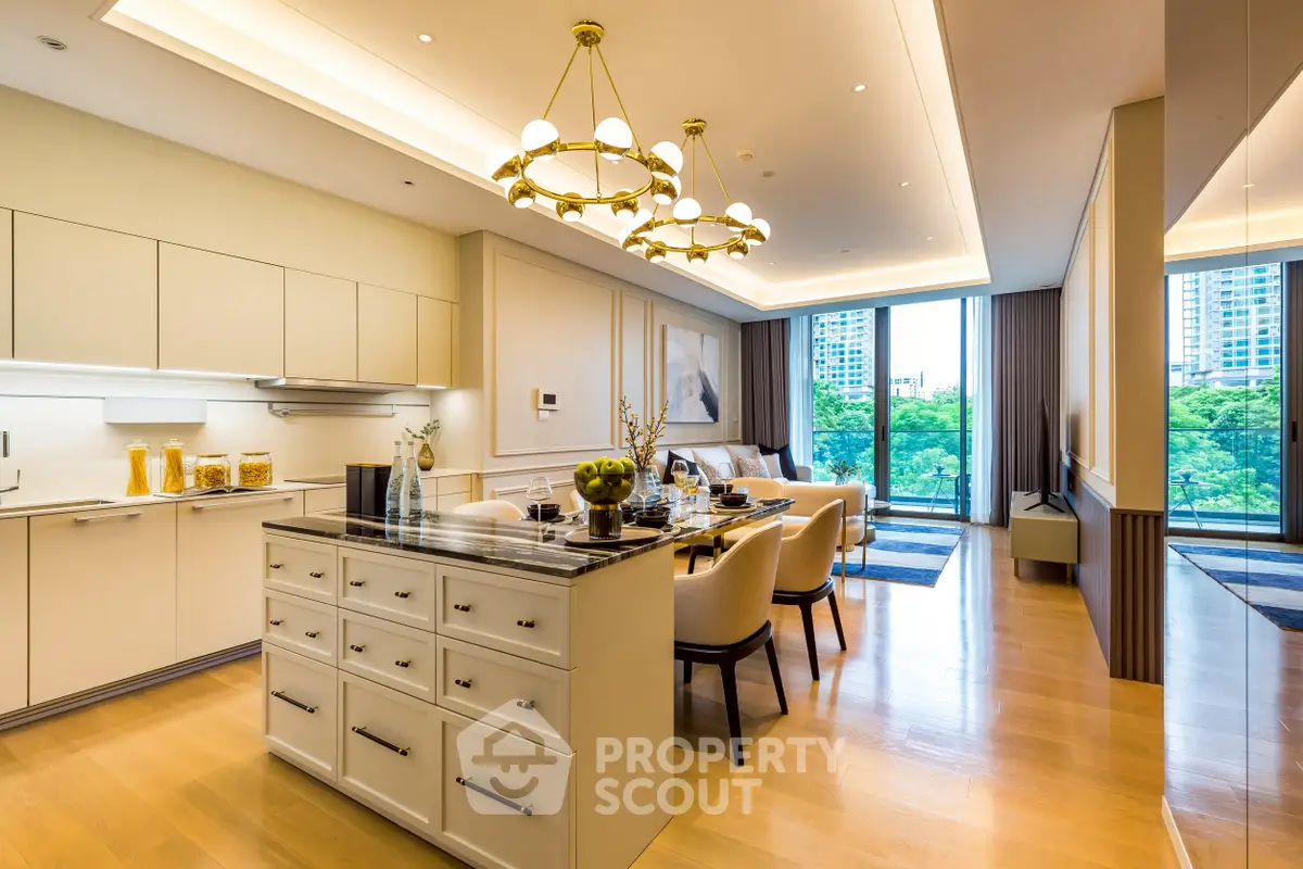 Luxurious open-plan living room and kitchen with elegant decor and city view.
