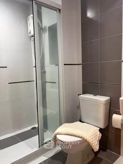 Modern bathroom with sleek shower and stylish tile design