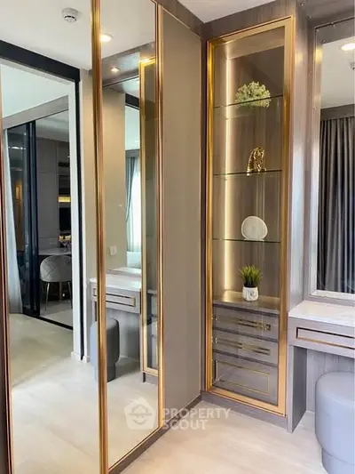 Luxurious modern bedroom with elegant mirrored wardrobe and stylish decor