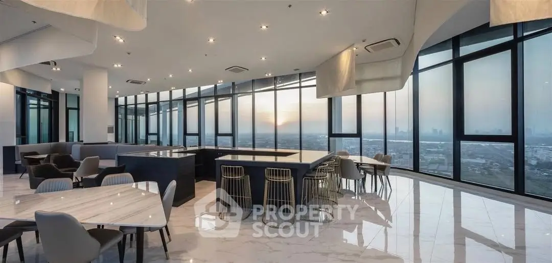 Luxurious penthouse with panoramic city views and modern open-plan design.