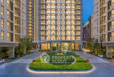 Luxurious modern apartment building with elegant entrance and landscaped garden