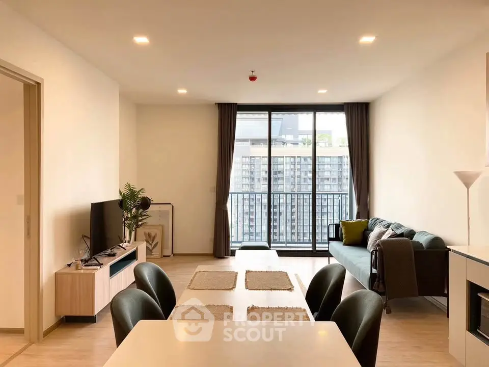 Modern living room with balcony view in stylish apartment