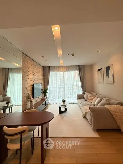 Modern living room with cozy sofa and stylish decor