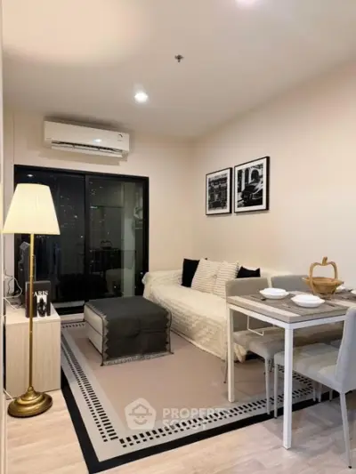 Chic modern living room with cozy seating and elegant decor, perfect for urban living.